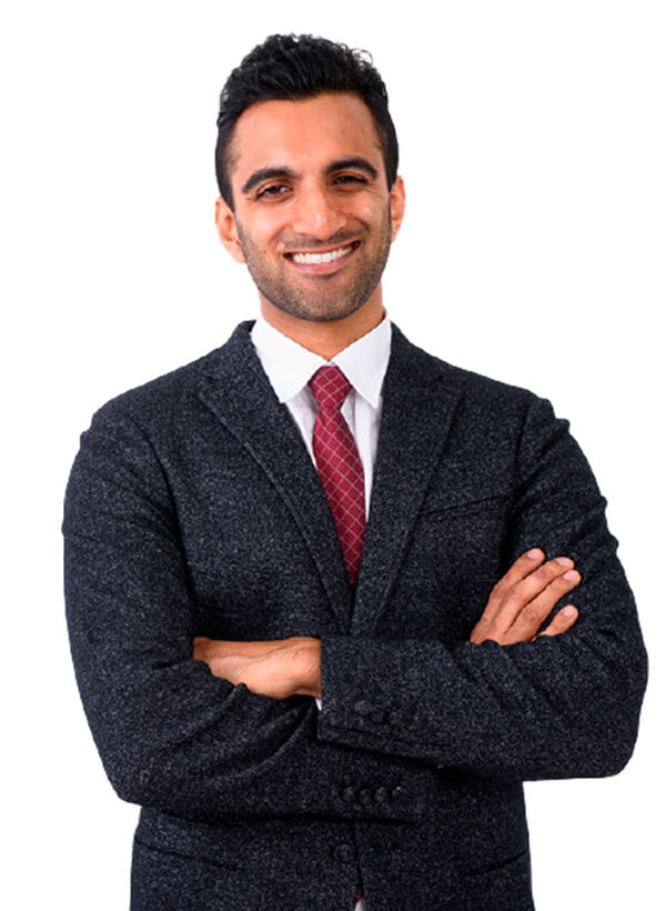 a man in a suit smiling