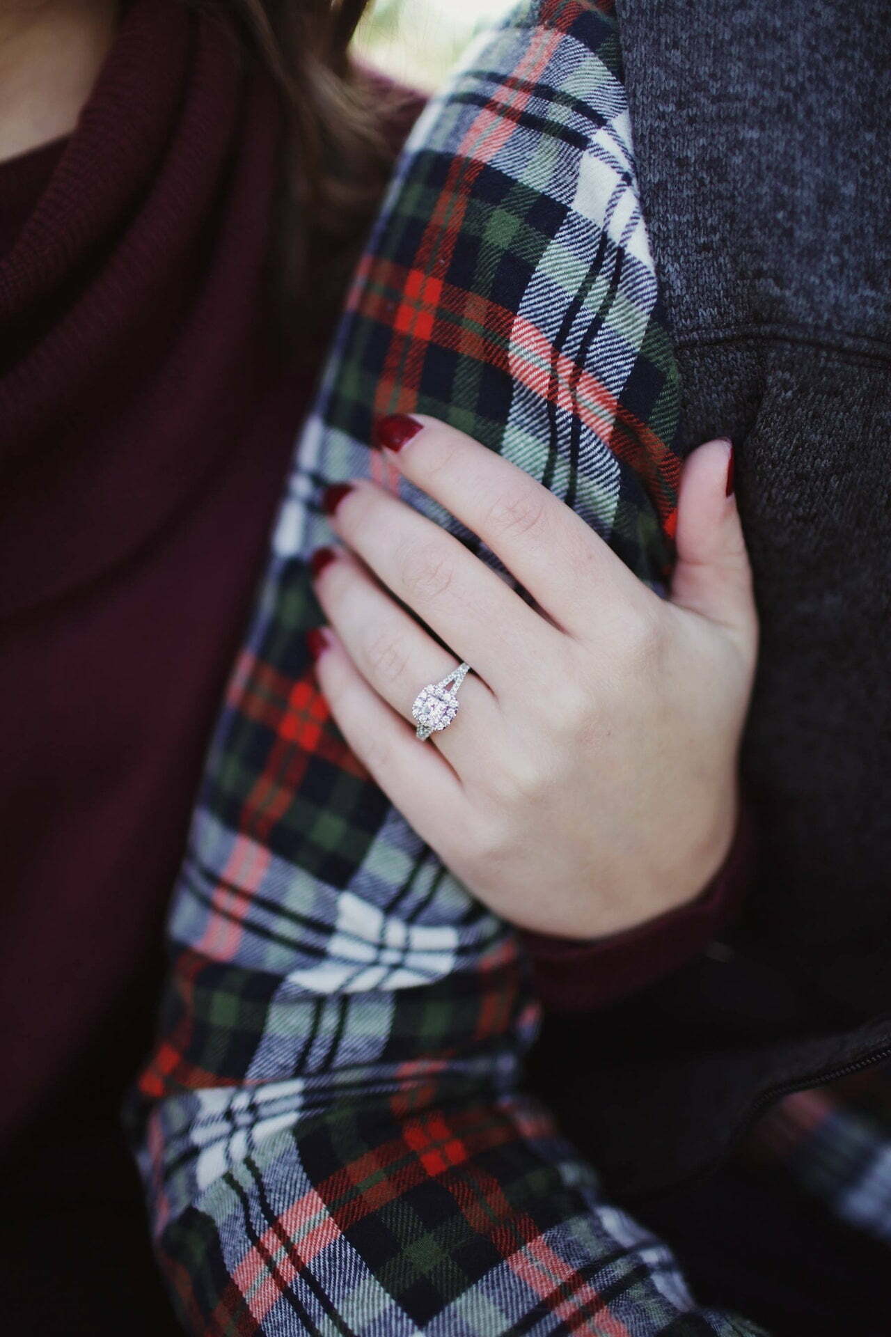 a person holding the hand to the face