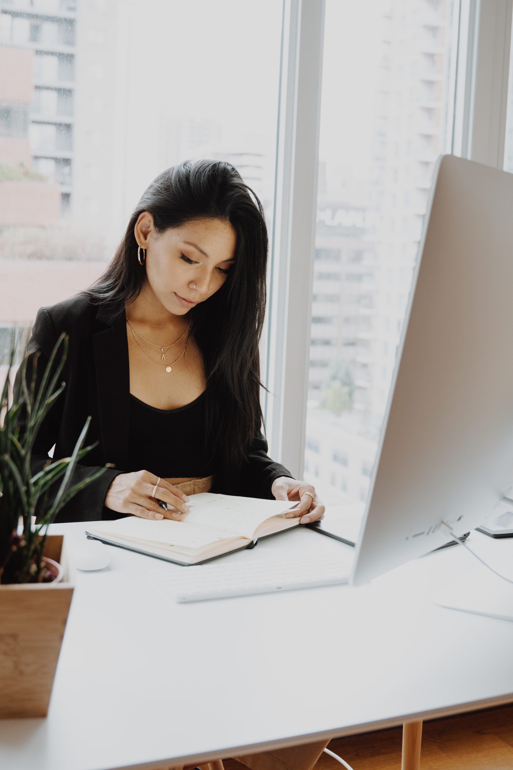 a woman sitting at a desk