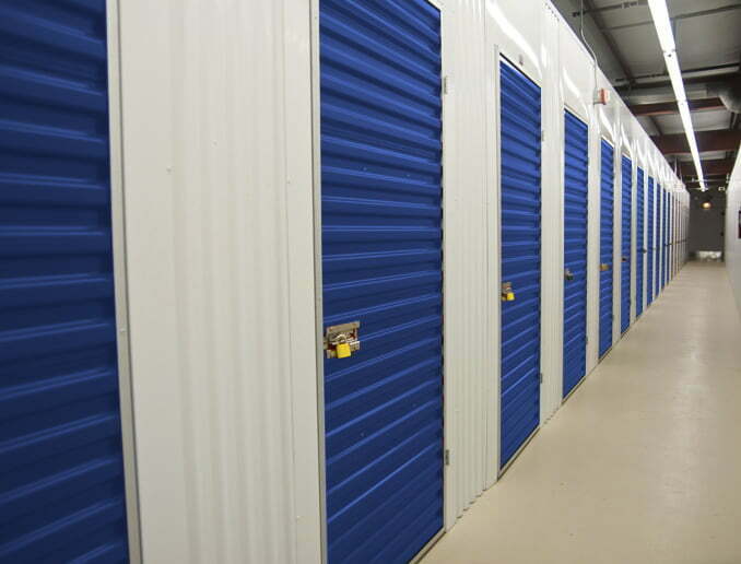 a row of white and blue servers