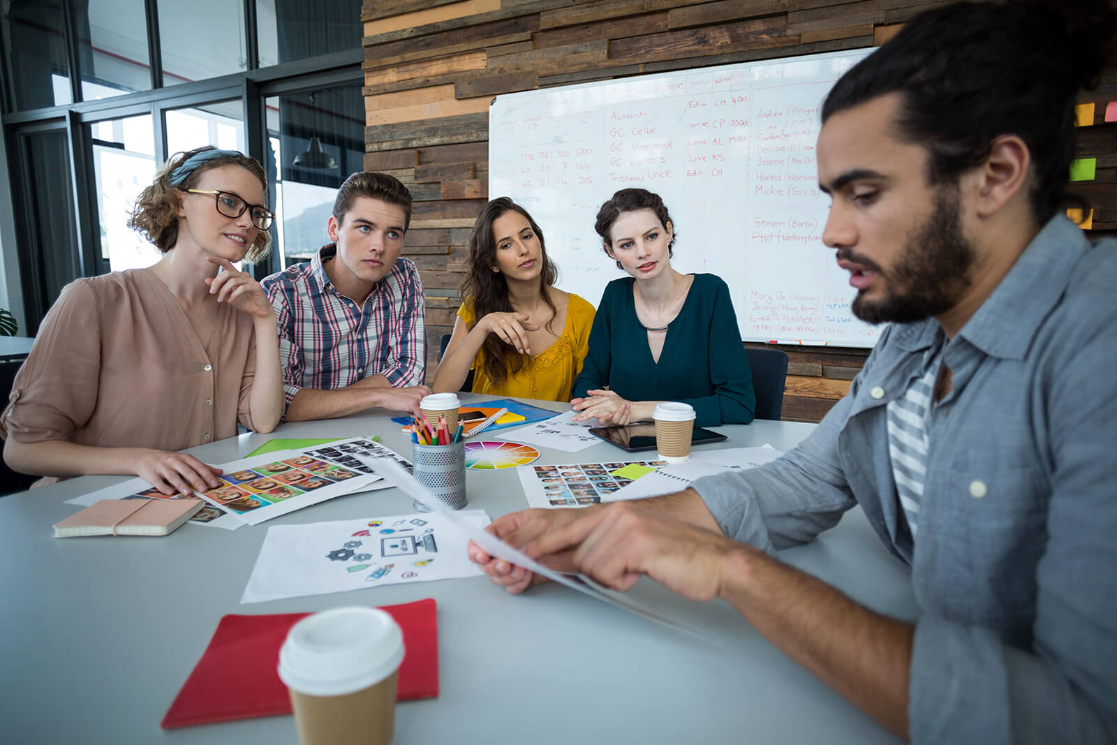 a group of people sitting at a table